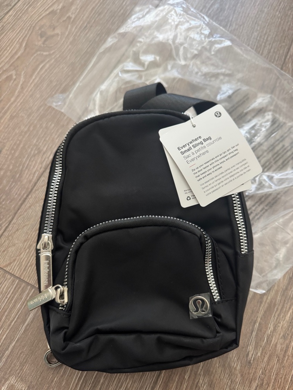 lululemon Small Black Sling Backpack with Silver Hardware